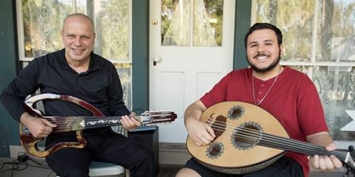 photo of Master Greek outi player Leonidas Zafiris with apprentice Nicholas Athanasatos